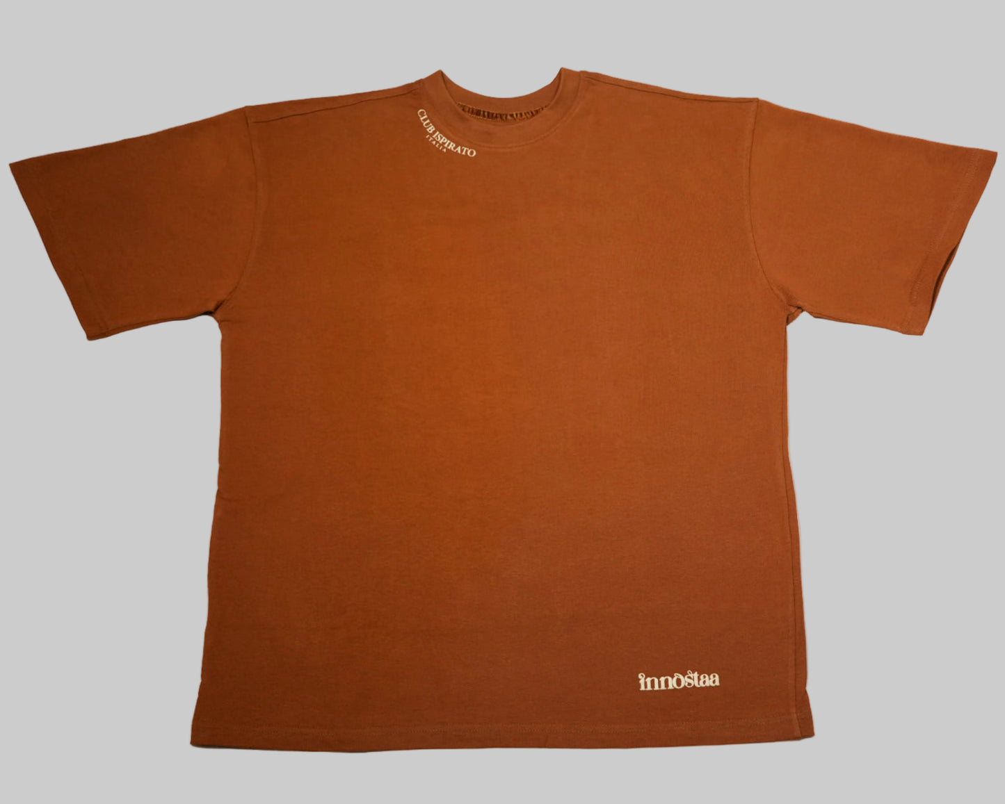Brown t-shirt with branding on a white background